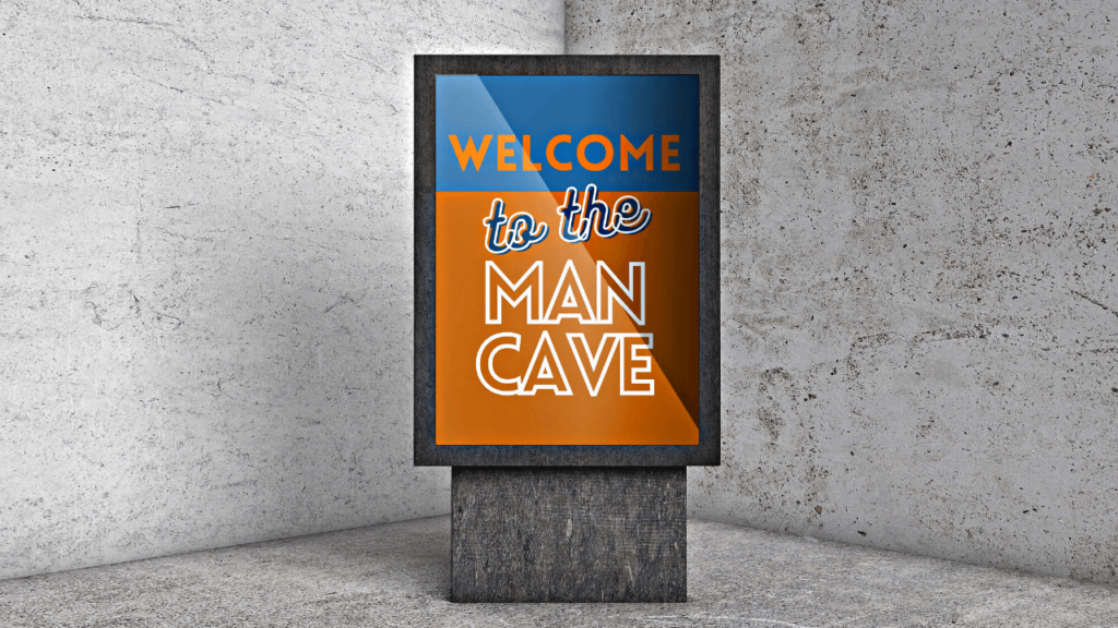 Blue and orange sign in front of concrete wall